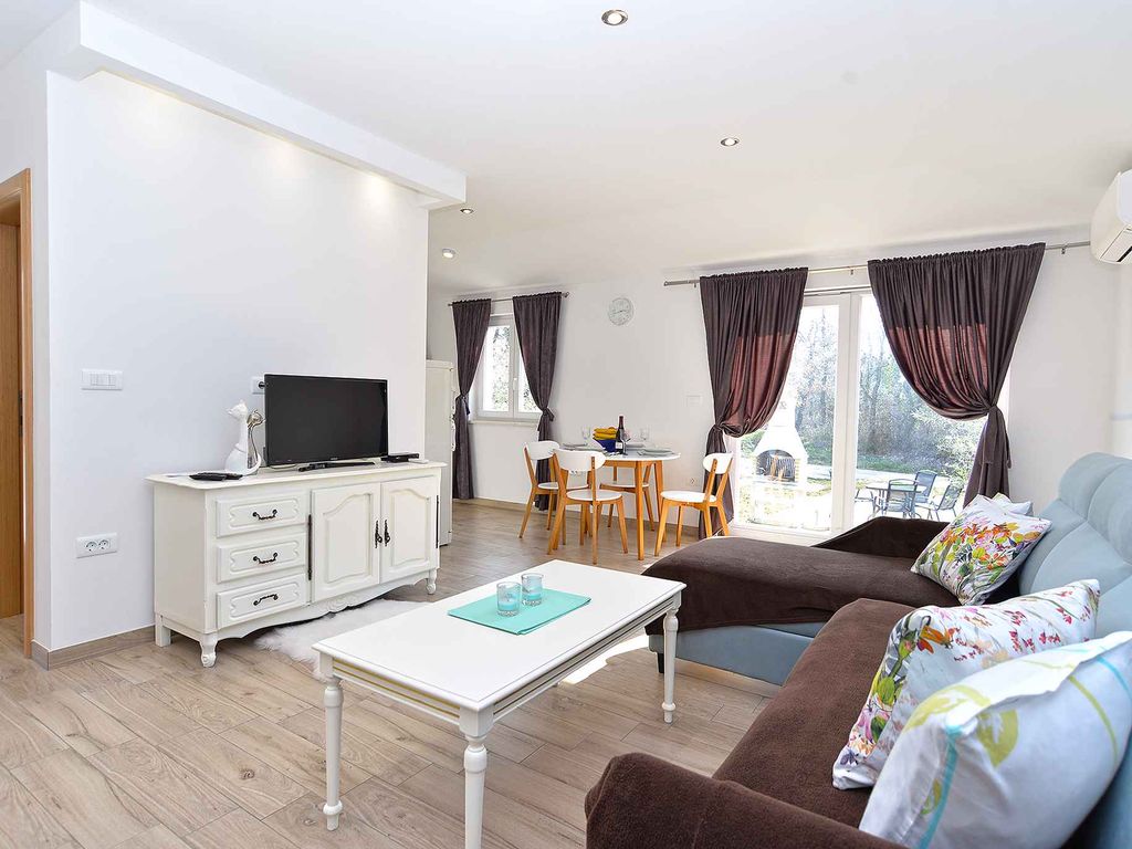 Ferienhaus mit Garten und Grill