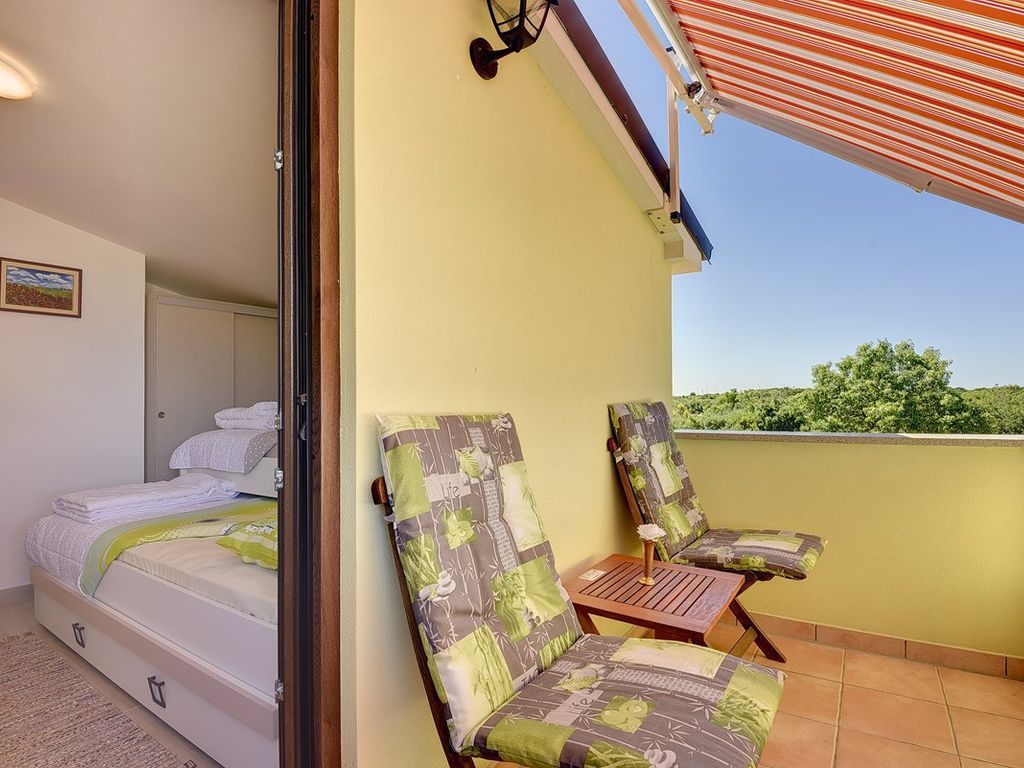 Ferienhaus mit Garten und Klimaanlage