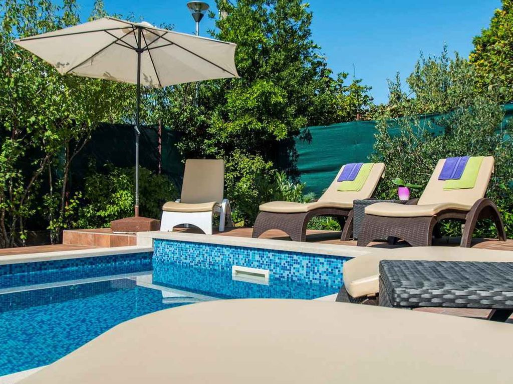 Ferienhaus mit Klimaanlage und Pool