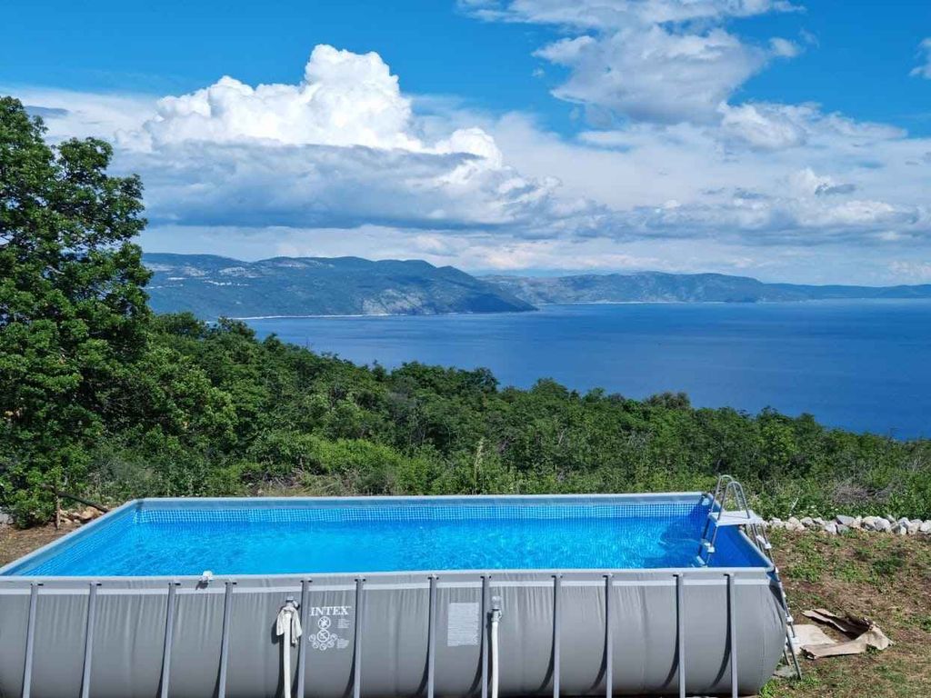 Ferienhaus mit Meerblick