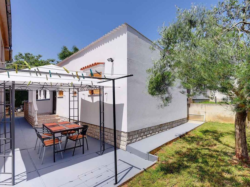 Ferienhaus mit zwei Schlafzimmern und einer Terrasse