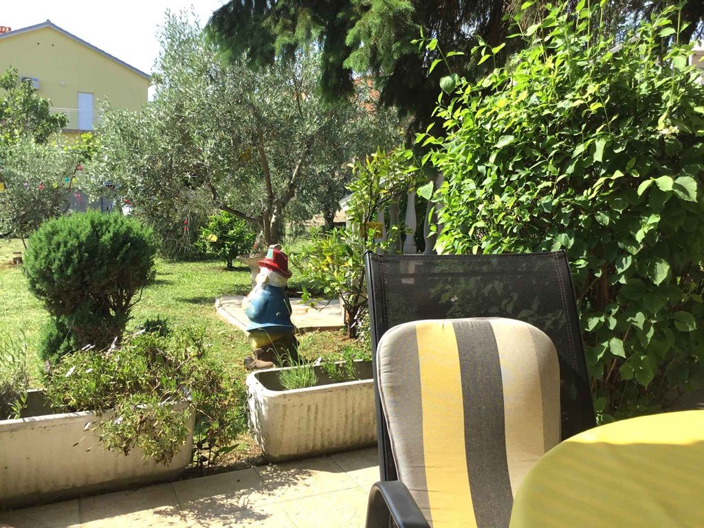 Ferienwohnung mit SAT-TV und Garten