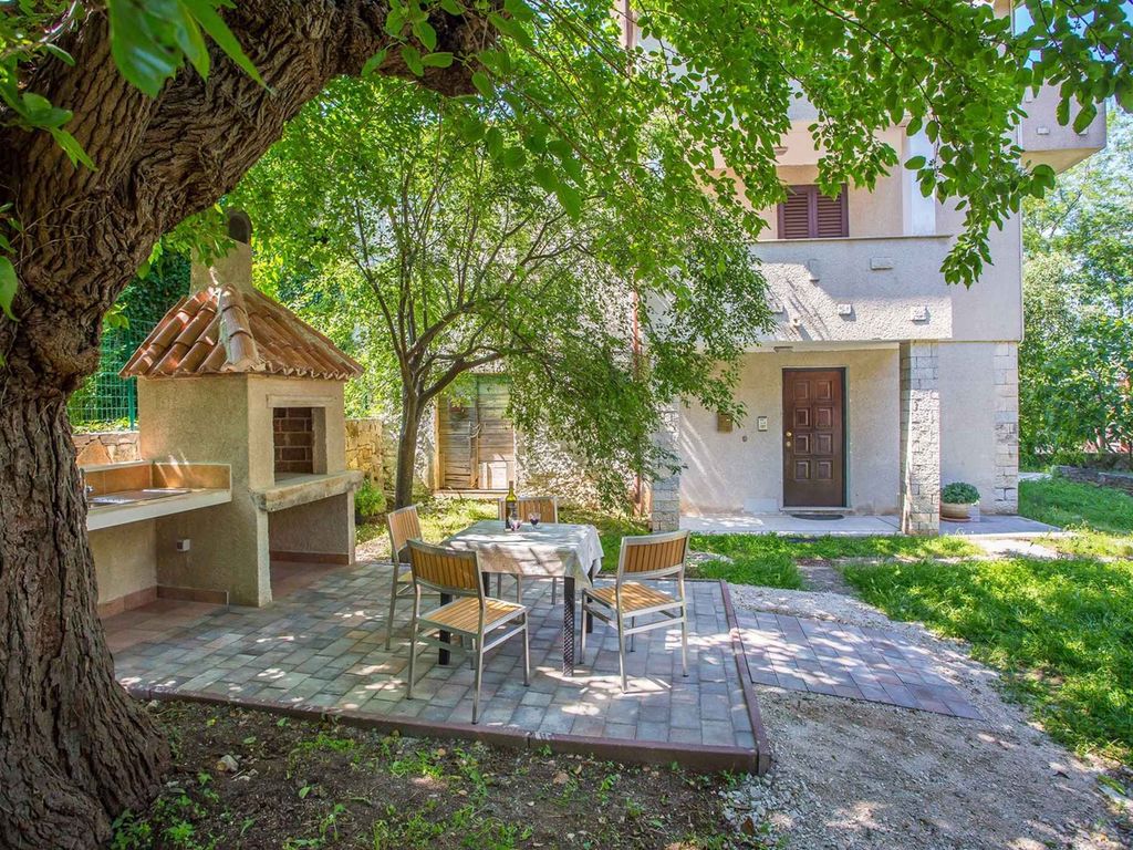 Ferienhaus mit Klimaanlage und Grill