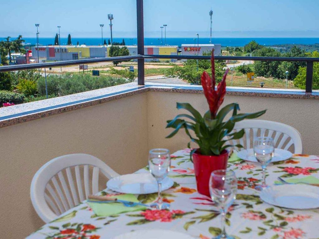 Ferienwohnung mit Balkon und Meerblick