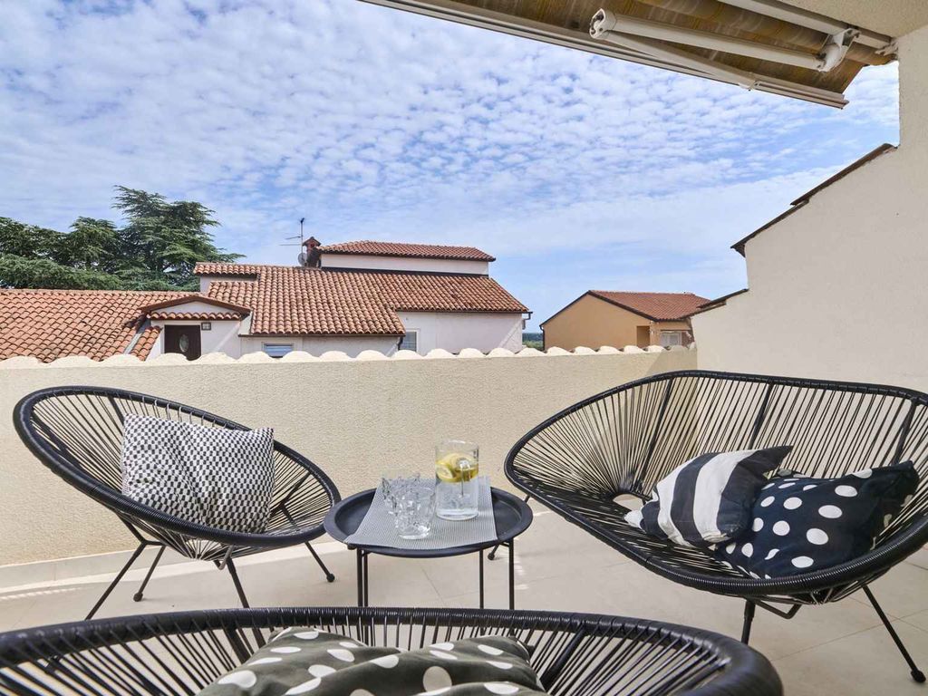 Ferienwohnung mit Klimaanlage und Balkon