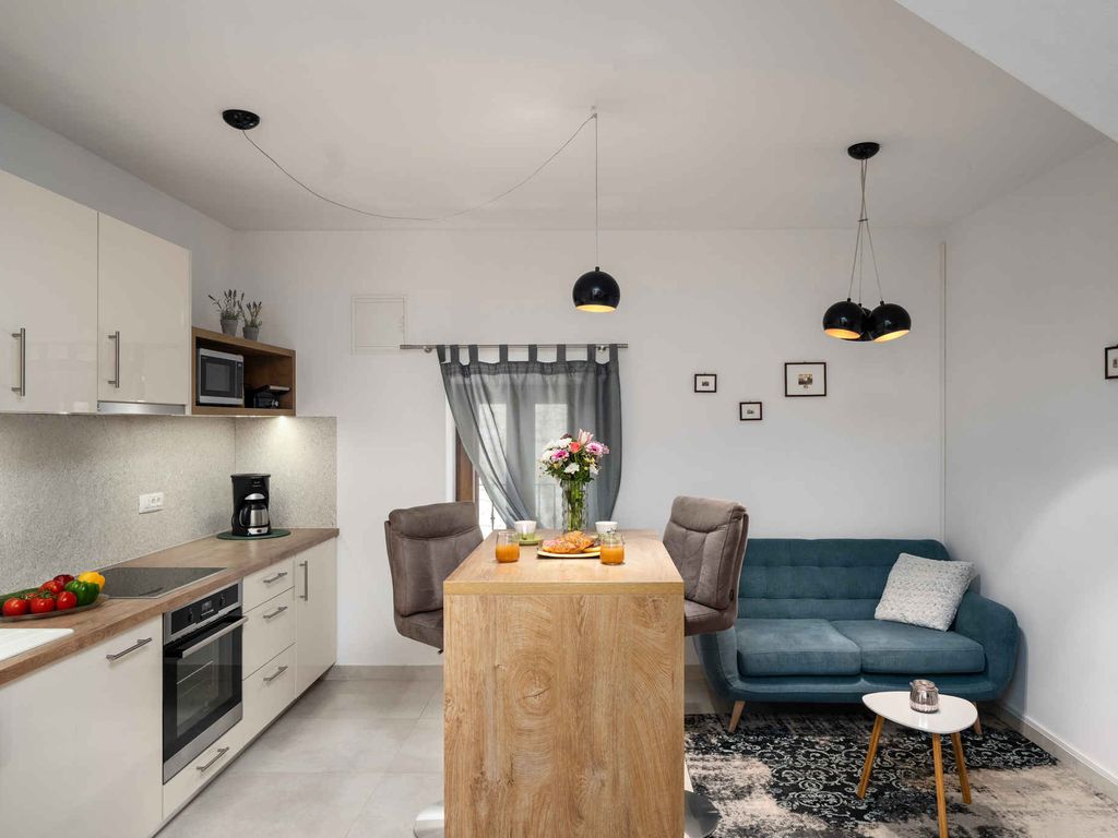 Ferienwohnung mit überdachter Balkon und privatem Innenhof
