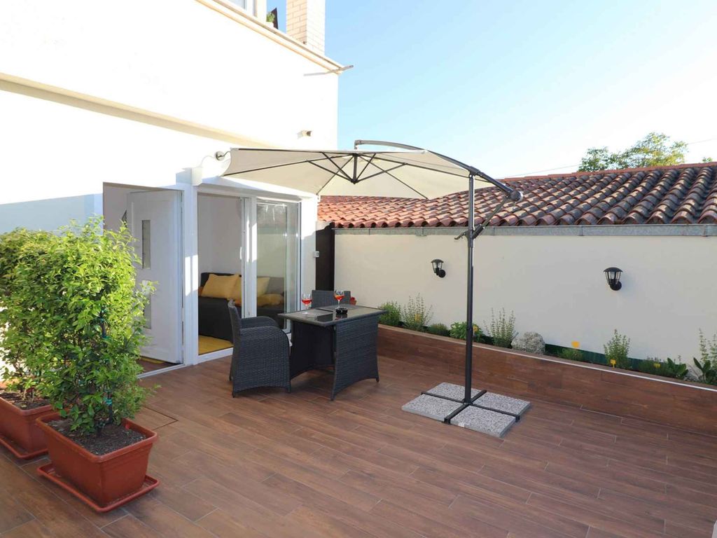 Studio mit Gartenterrasse in Strandnähe