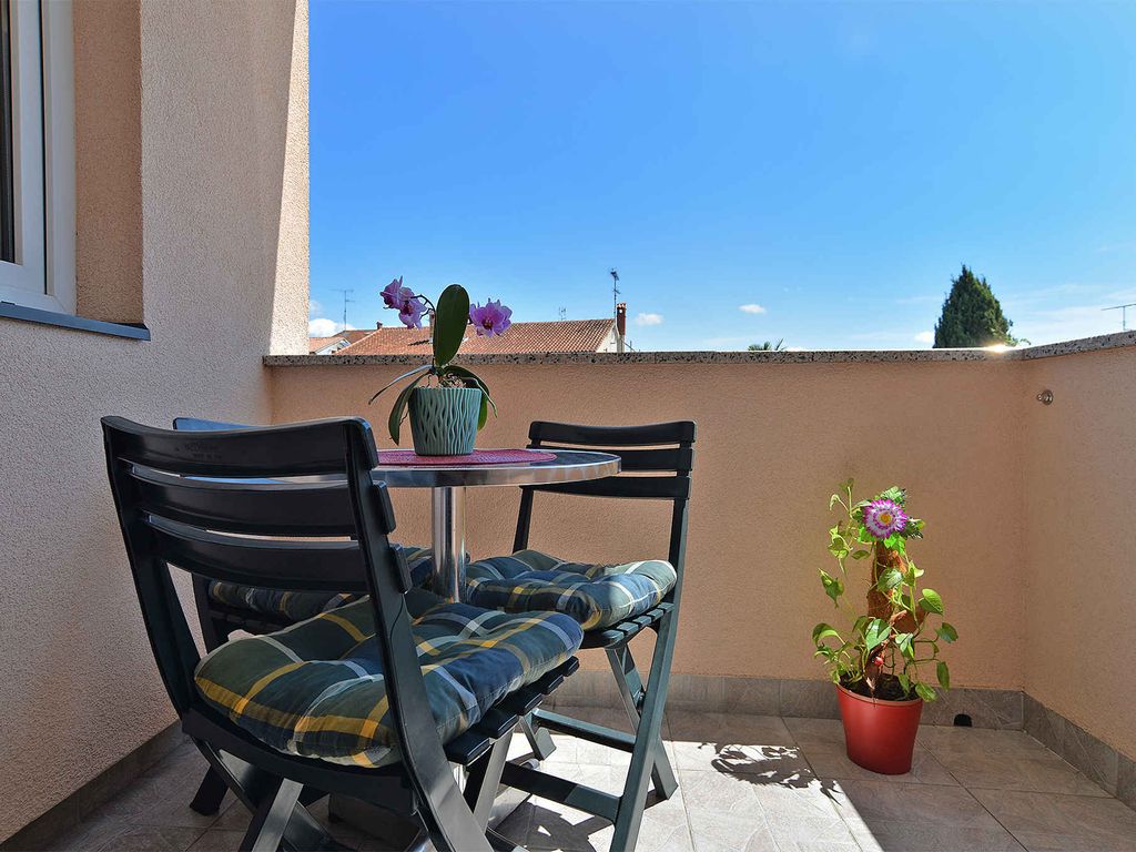 Ferienwohnung mit Klimaanlage und Balkon