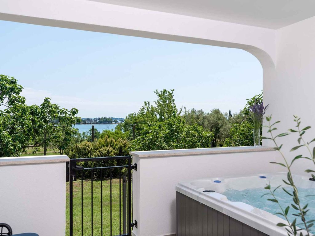 Ferienhaus mit Whirlpool und Meerblick