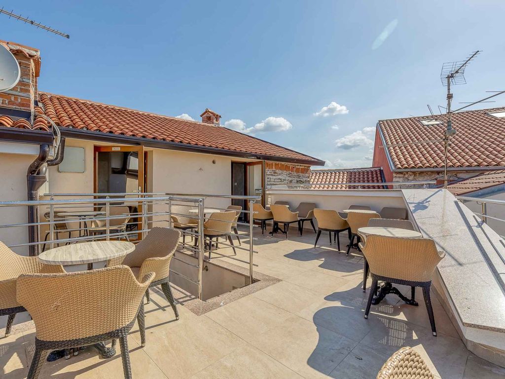 Ferienwohnung mit wunderschönem Blick von der Dachterrasse auf den Strand
