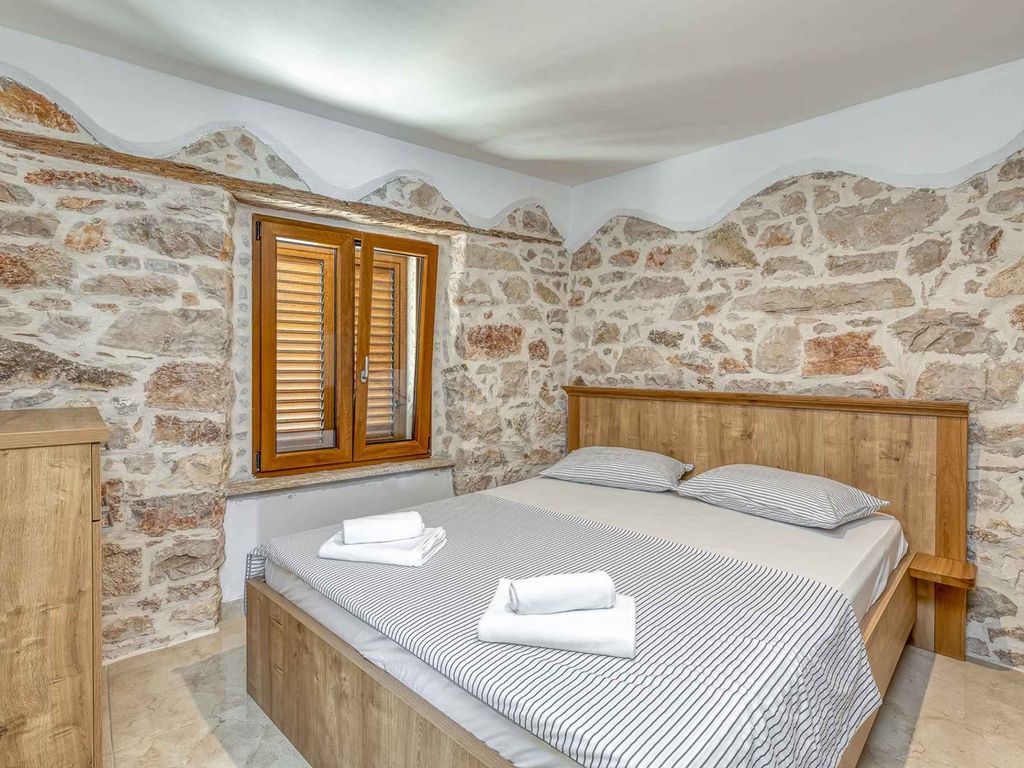 Ferienwohnung mit wunderschönem Blick von der Dachterrasse auf den Strand