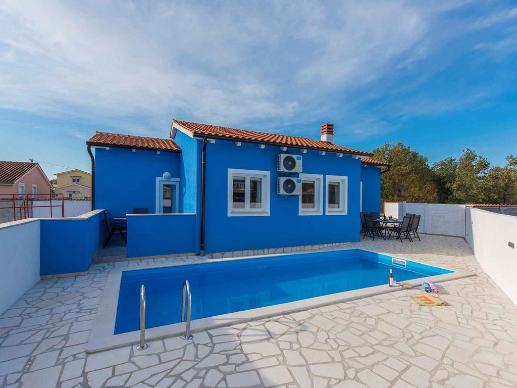 Ferienhaus mit Klimaanlage und Pool