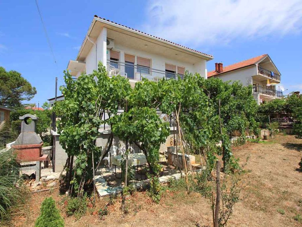 Ferienhaus mit Garten und Grill in Strandnähe