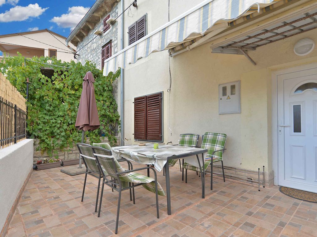 Ferienhaus mit Terrasse und Klimaanlage