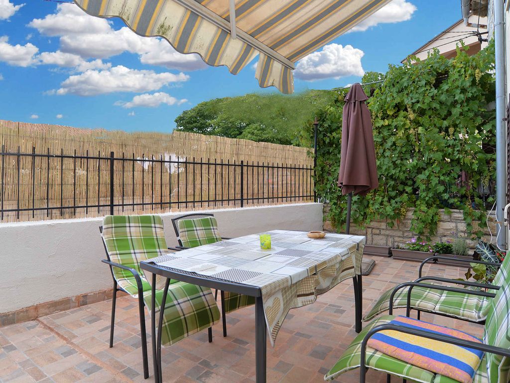 Ferienhaus mit Terrasse und Klimaanlage