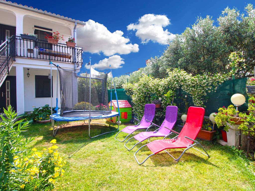 Ferienwohnung mit Klima und gedeckter Terrasse