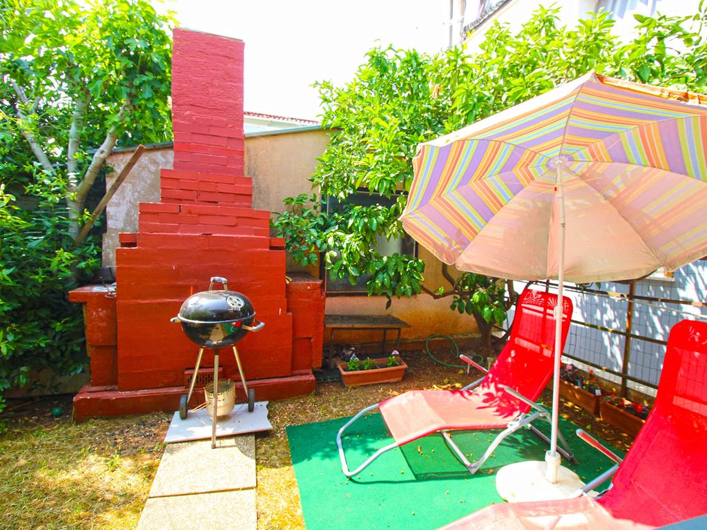 Ferienwohnung mit Klima und gedeckter Terrasse