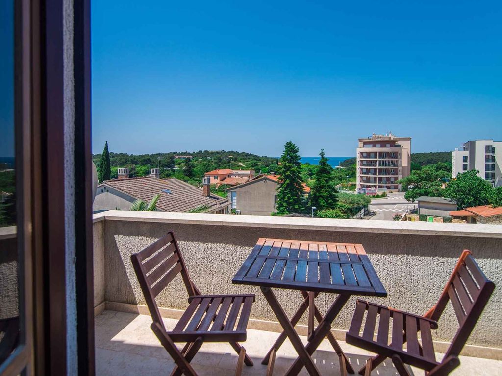 Ferienwohnung mit Balkon und Meerblick