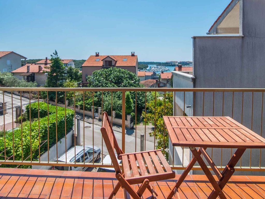 Ferienwohnung mit Balkon und Meerblick