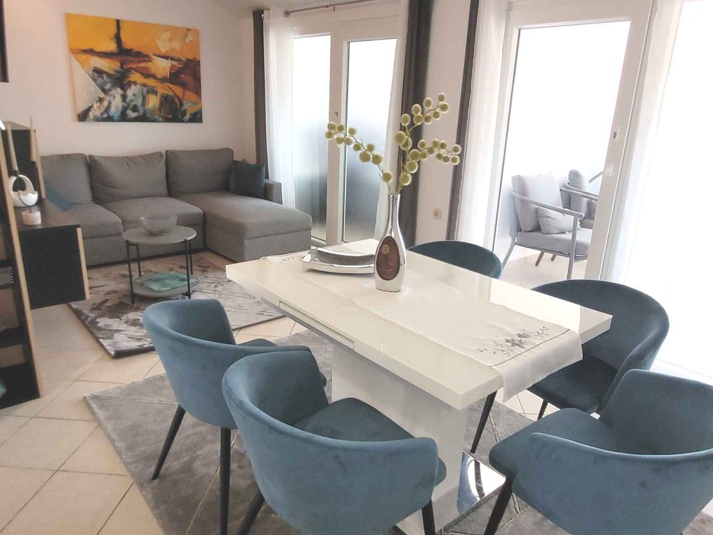 Ferienwohnung mit Wintergarten und Meerblick