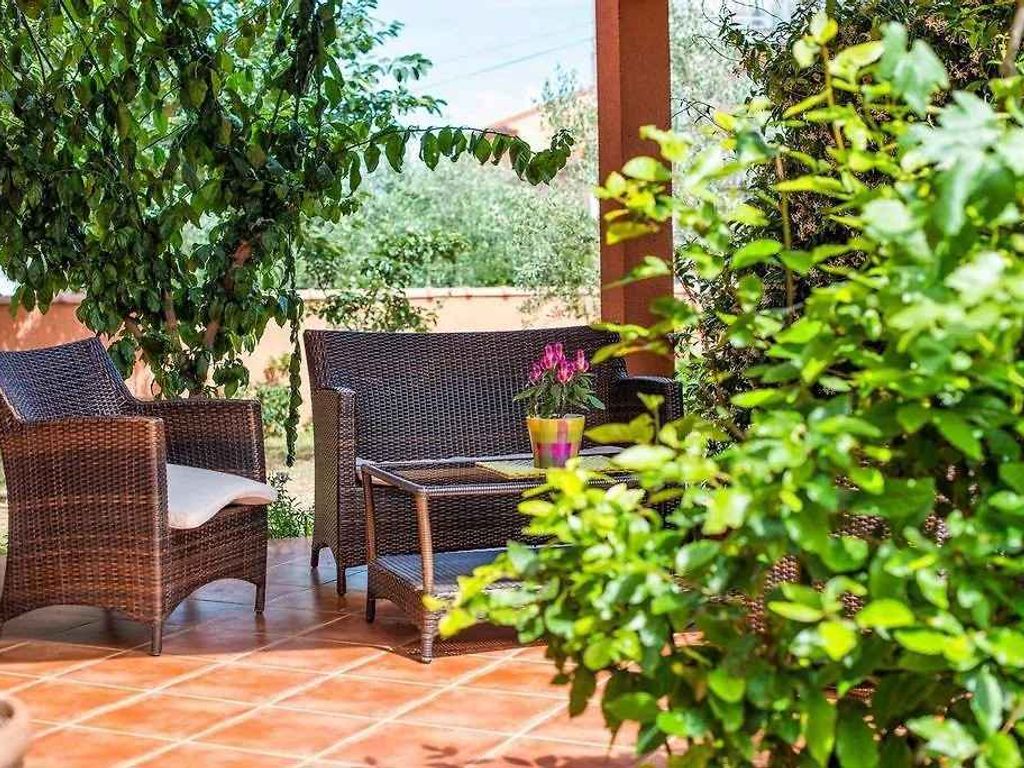Ferienwohnung mit Garten und Klimaanlage