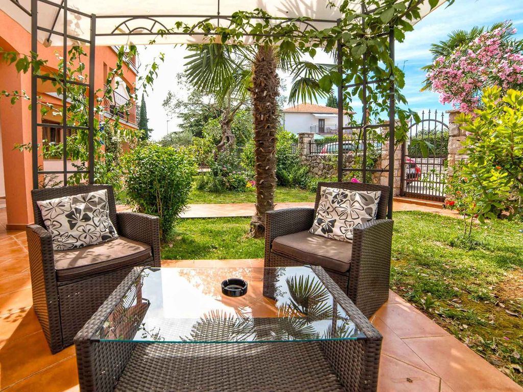 Ferienwohnung mit Garten und Klimaanlage