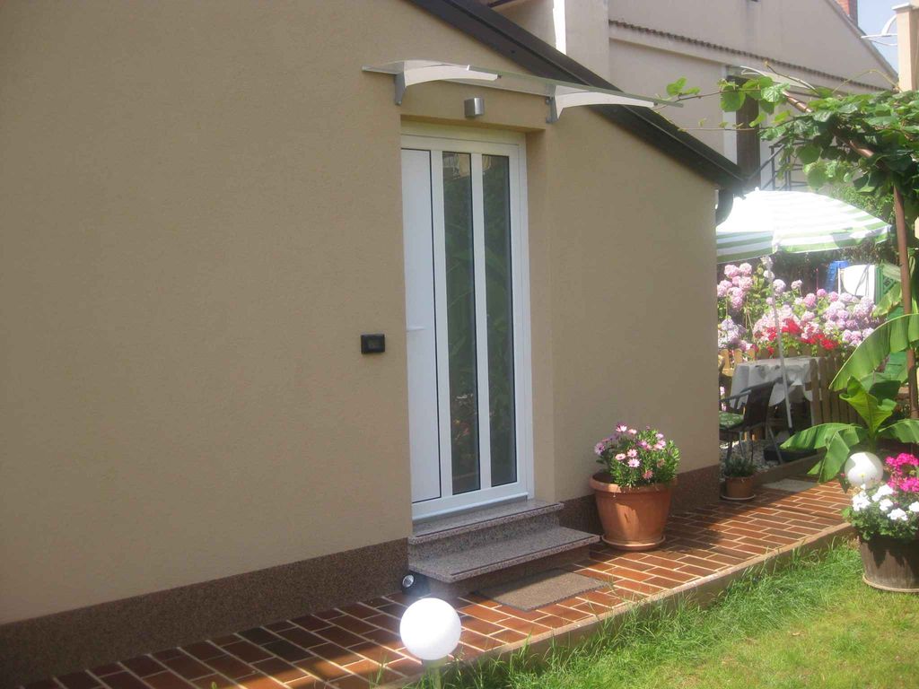Ferienhaus mit Gartenterrasse, modern eingerichtet