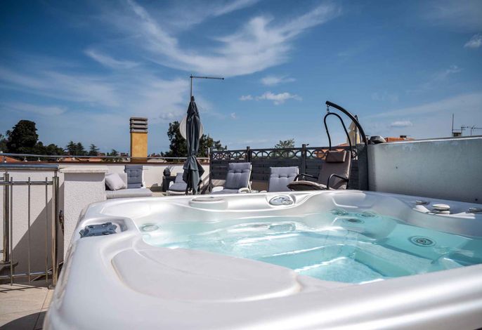 Ferienwohnung mit Dachterrasse und Whirlpool