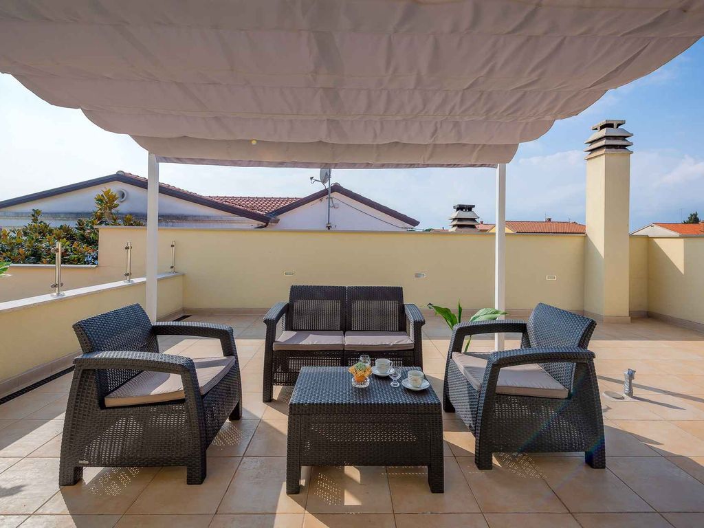 Ferienwohnung mit Garten und Klimaanlage