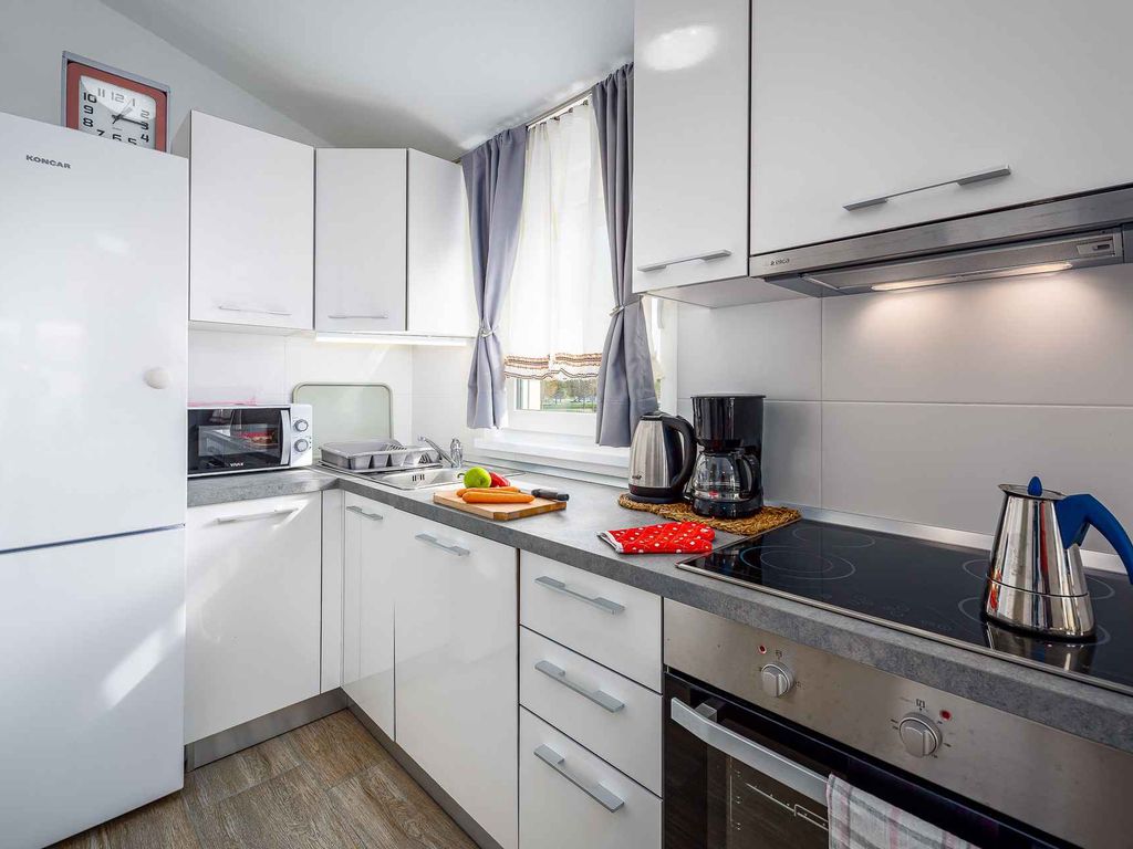 Ferienwohnung mit Garten und Klimaanlage