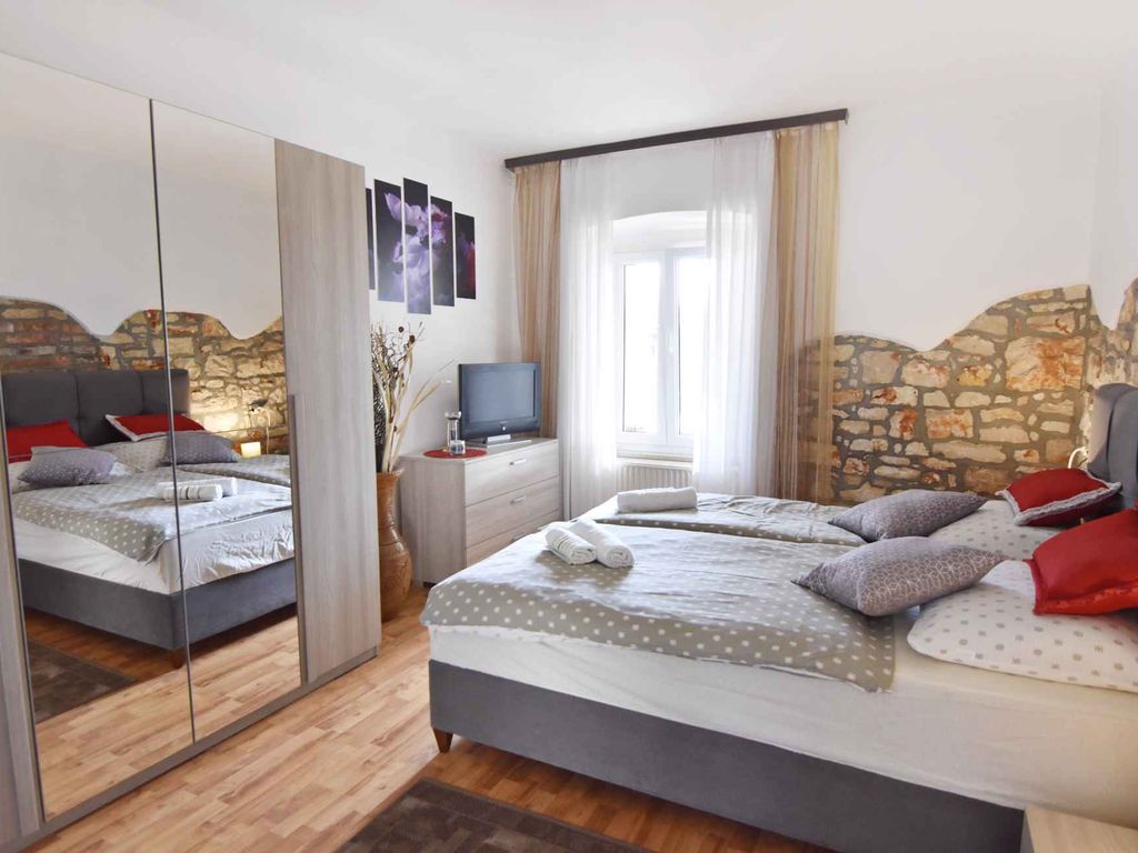 Ferienwohnung mit Klimaanlage und Hof mit Meerblick