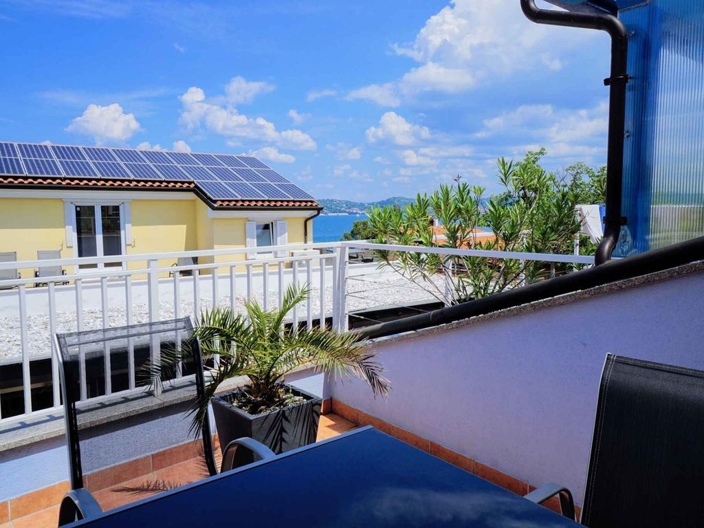 Ferienwohnung mit Balkon und Meerblick