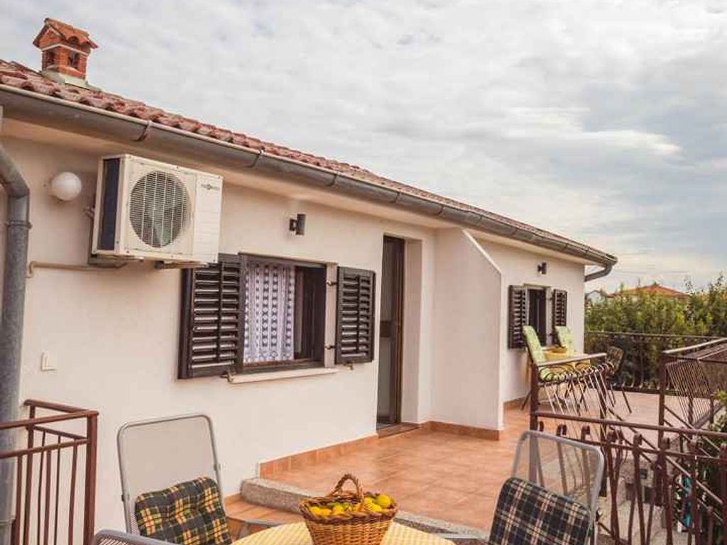 Ferienwohnung mit Garten und Grill zur gemeinsamen Nutzung