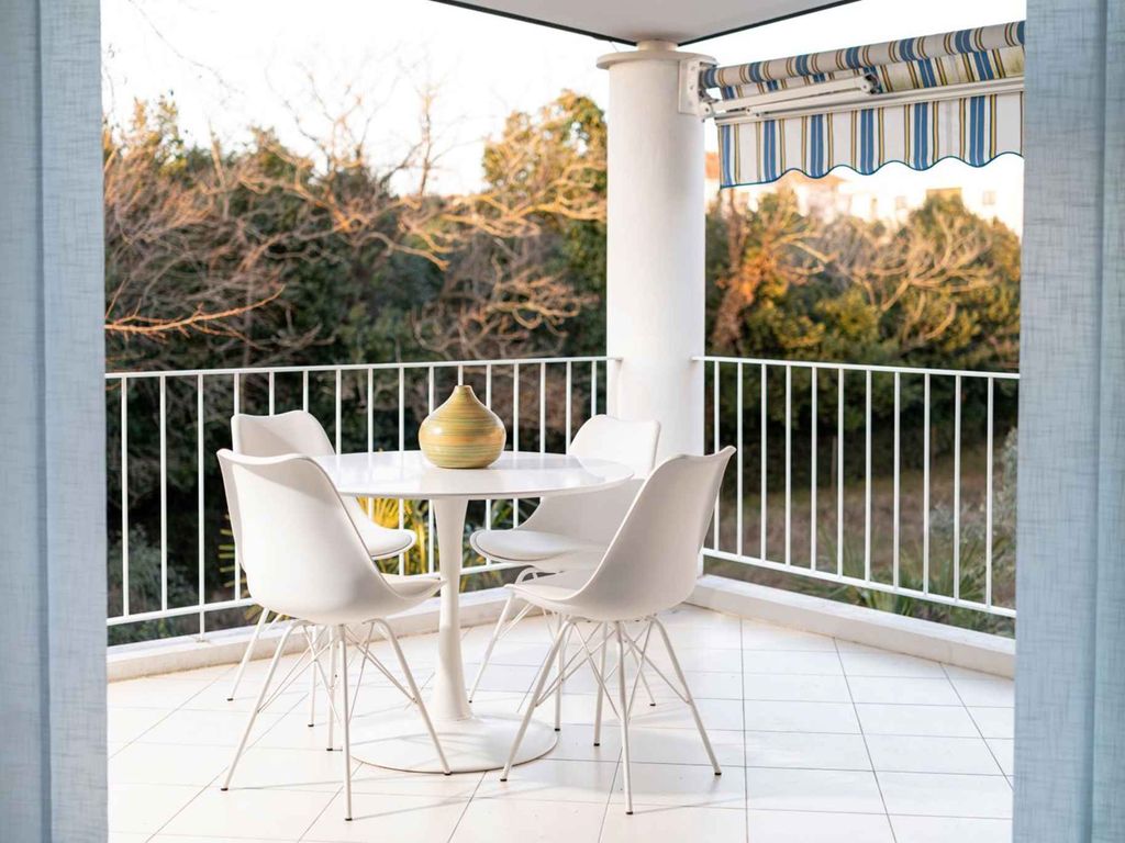 Ferienwohnung mit Klimaanlage, Balkon und Meerblick