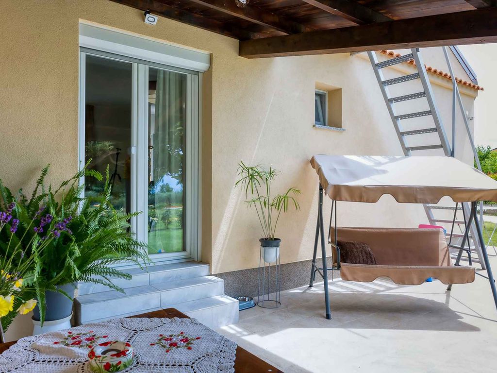 Ferienhaus mit Klimaanlage, Garten