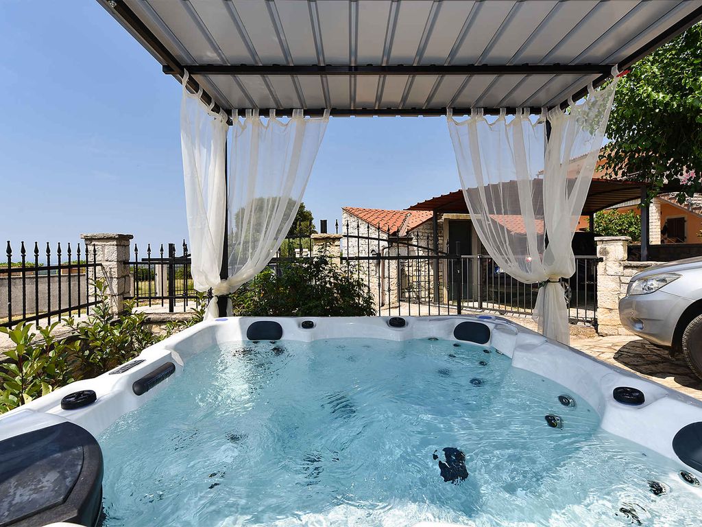 Ferienhaus mit Klimaanlage und Blick auf das Meer