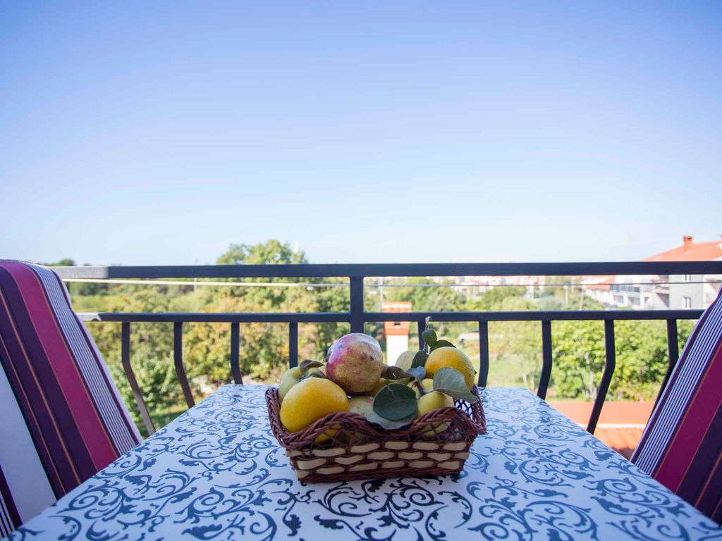 Ferienwohnung mit Balkon, Grillmöglichkeit und Garten in Rovinj