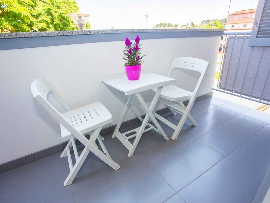 Ferienwohnung mit Balkon und Klimaanlage
