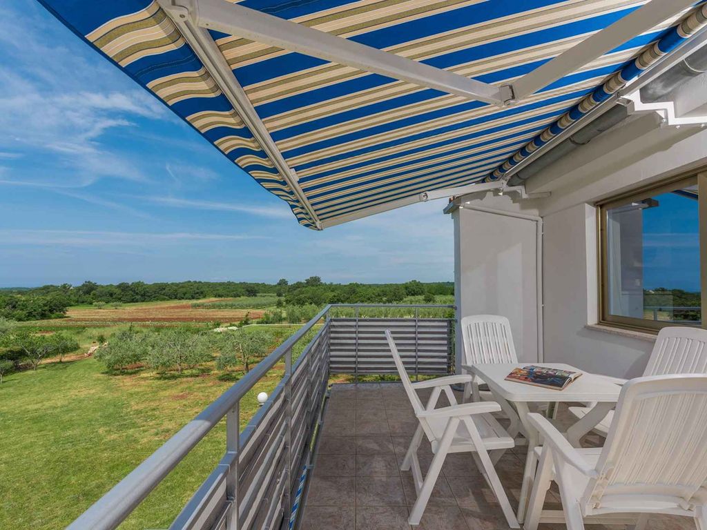 Ferienwohnung mit Klimaanlage und Balkon
