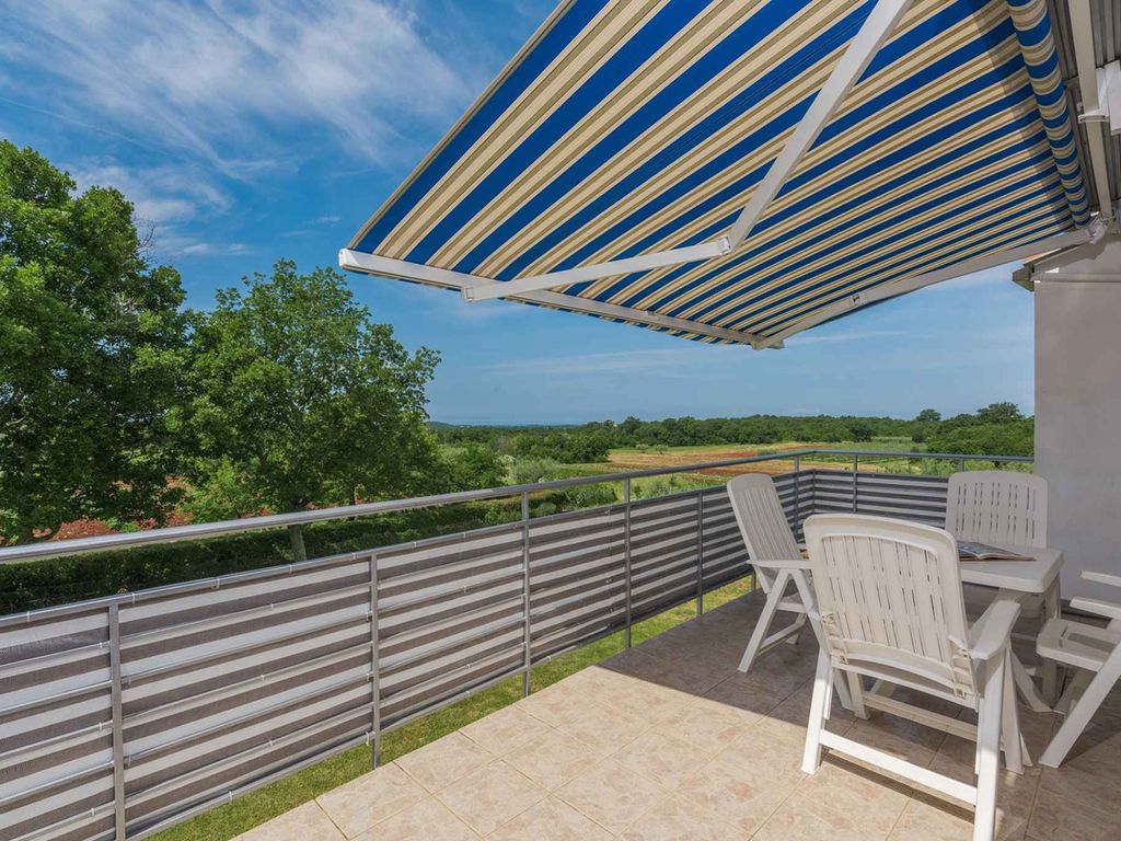 Ferienwohnung mit Klimaanlage und Balkon