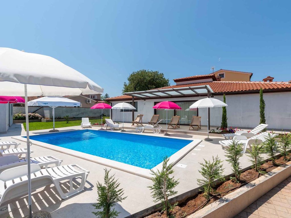 Apartment mit 1 Schlafzimmer, Garten und Gemeinschaftspool, in der Nähe von Poreč
