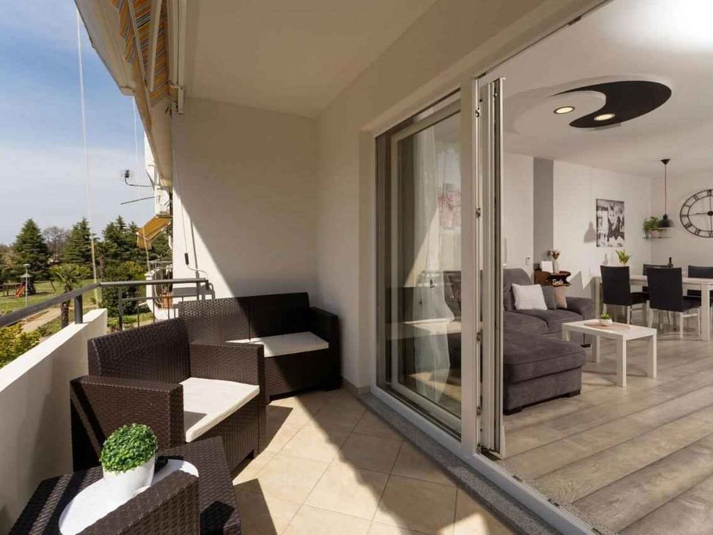 Ferienwohnung mit Klimaanlage und Balkon