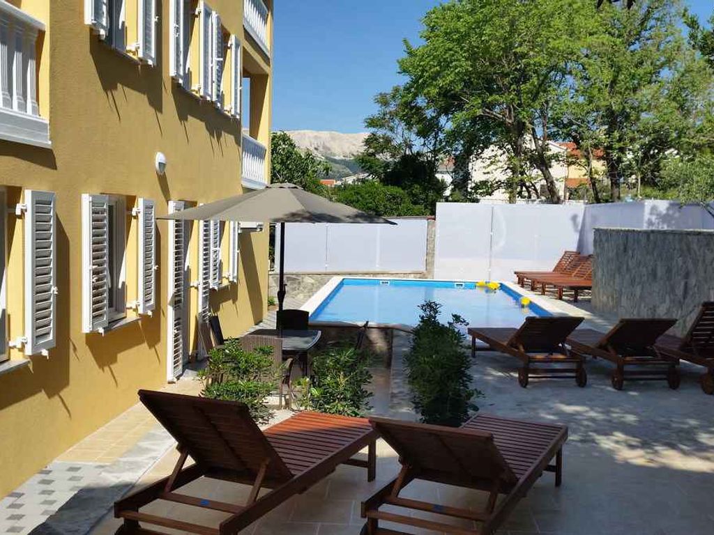 Ferienwohnung mit Pool und Grill zur gemeinsamen Nutzung
