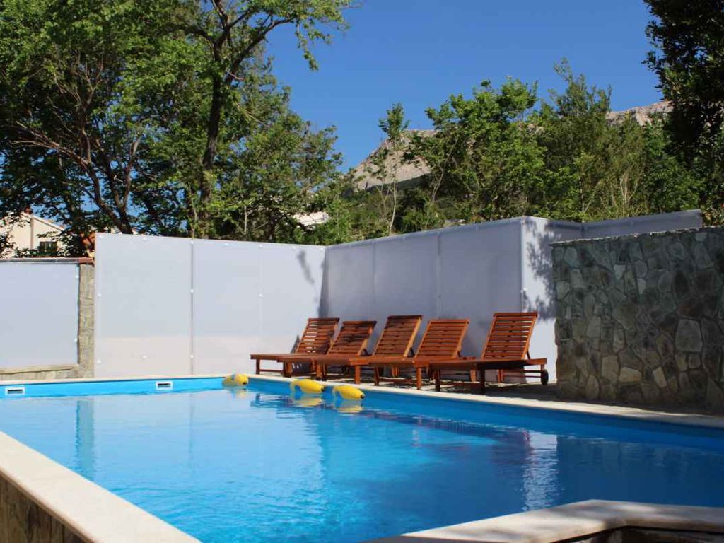 Ferienwohnung mit Pool und Grill zur gemeinsamen Nutzung