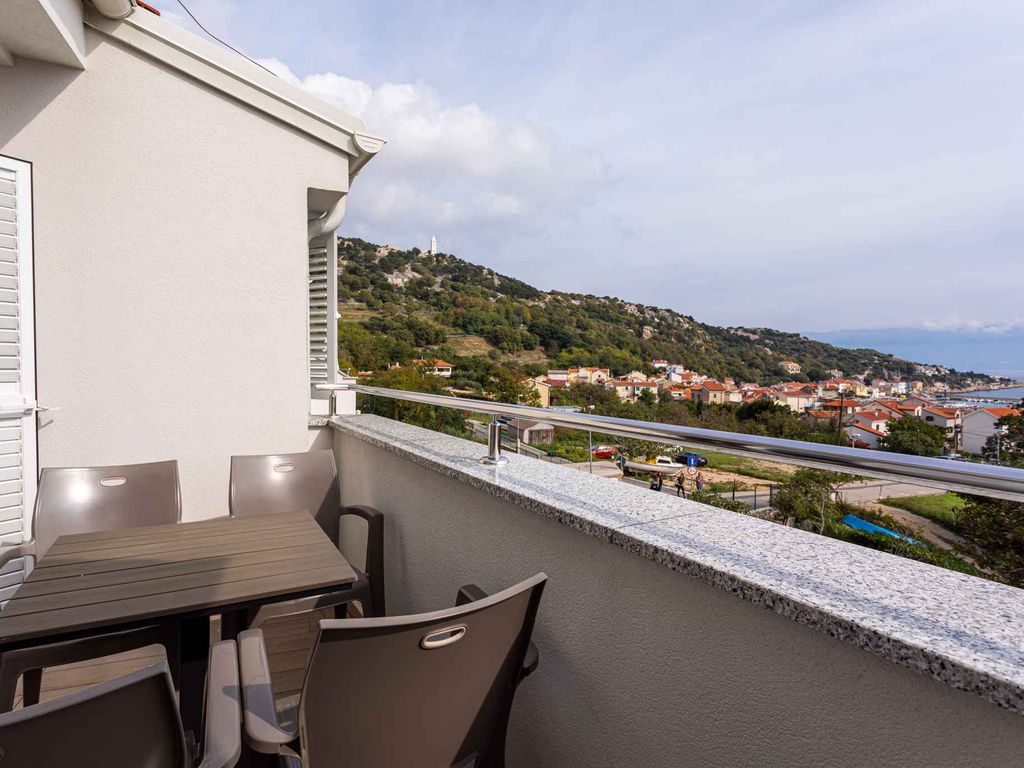 Ferienwohnung mit einen Balkon und Meerblick
