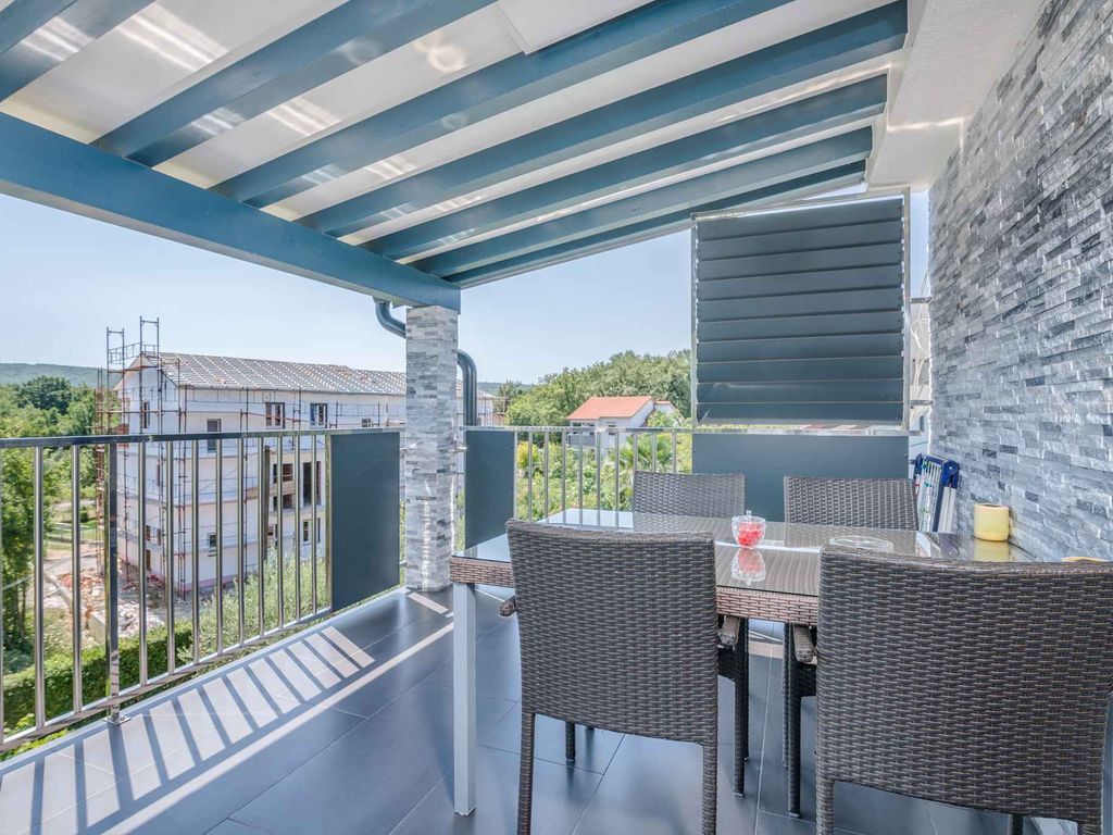 Ferienwohnung mit Klimanlage und Balkon