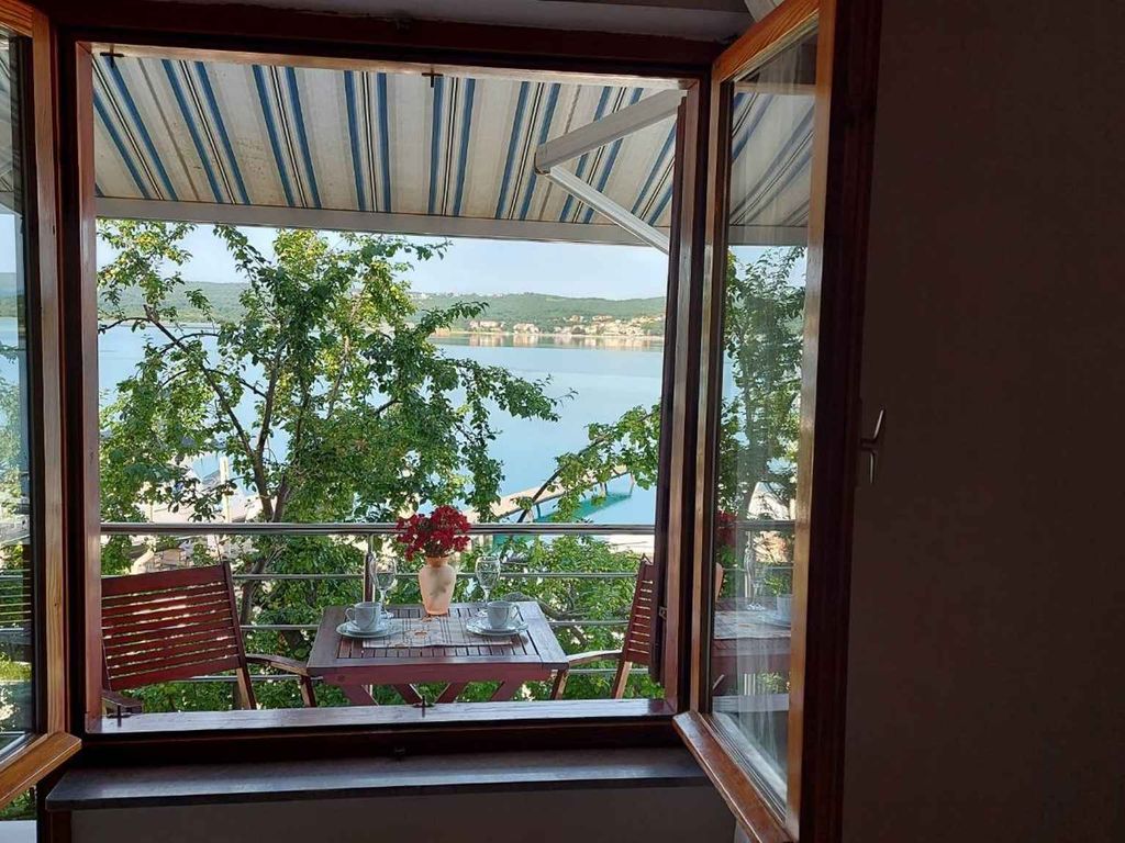 Ferienwohnung mit Balkon und Meerblick
