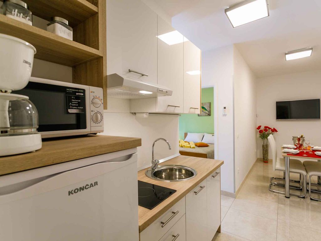 Ferienwohnung mit Klimaanlage und Grill zur gemeinsamen Nutzung