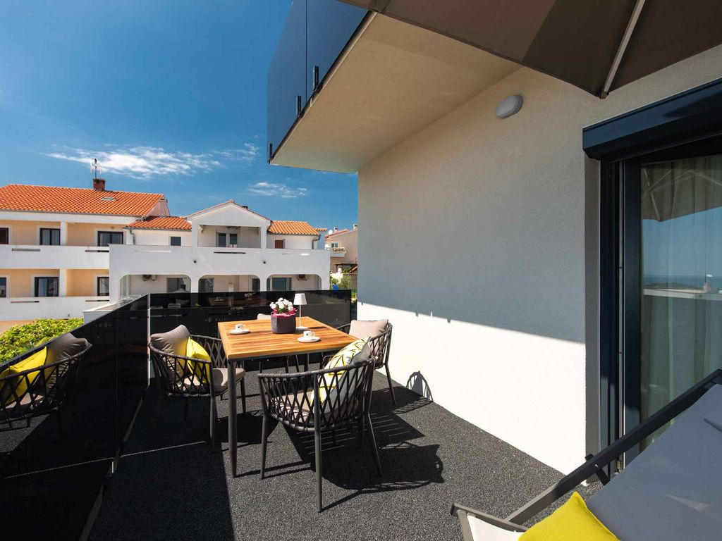 Ferienwohnung mit Meerblick und Pool zur gemeinsamen Nutzung