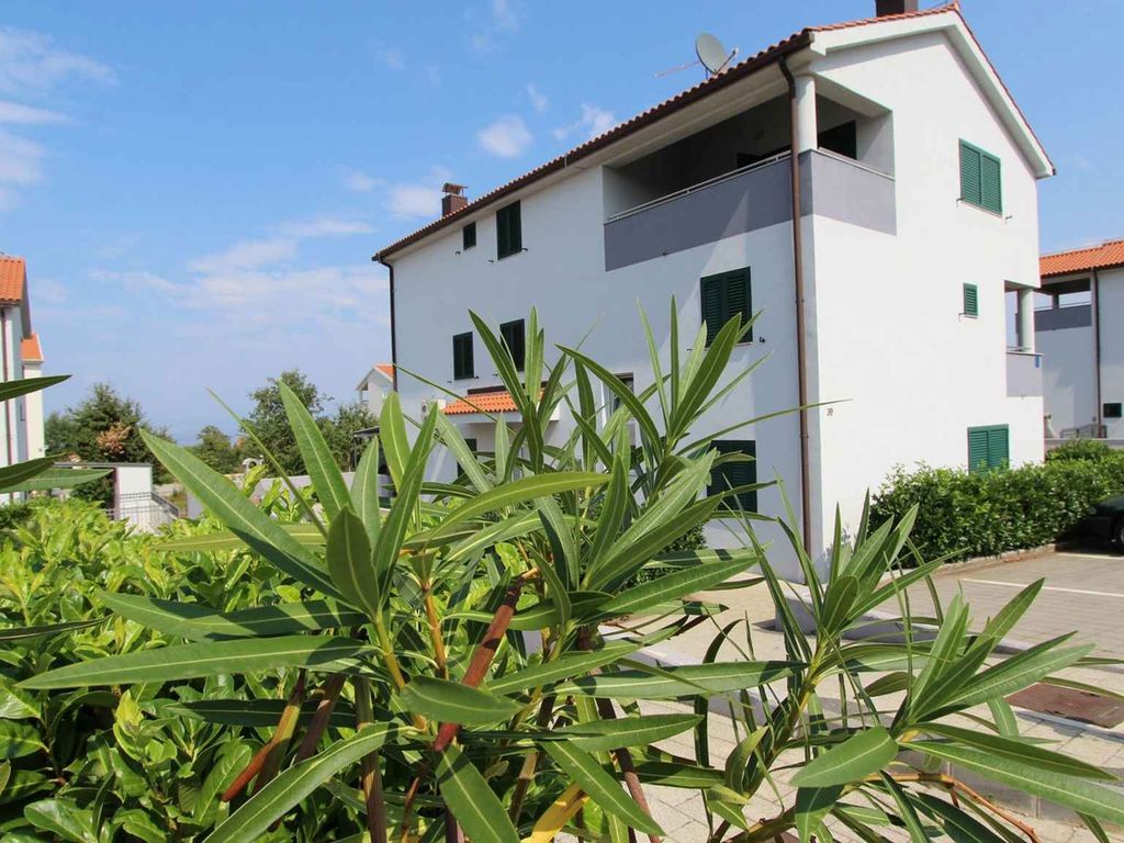 Ferienwohnung mit Balkon und Klimananlage